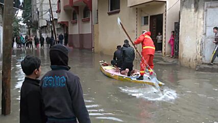 State of Palestine: Heavy flooding batters Gaza Strip forcing locals to move around on paddleboards