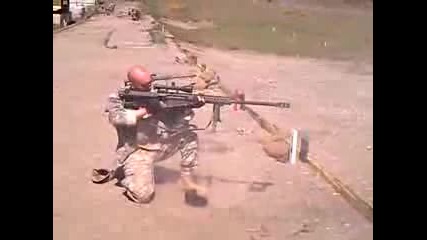 .50 cal Barrett sniper rifle fired while kneeling!