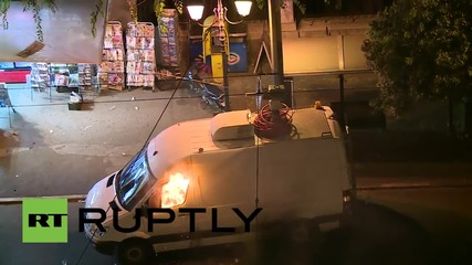 Greece: Athens protesters set van on fire