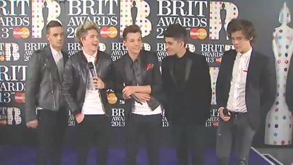Brit Awards_ One Direction celebrate Global Success Award in the winner's room