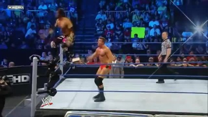 Diving Corkscrew Senton to a standing opponent - Trent Barreta