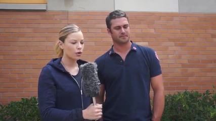 Taylor Kinney, Lauren German on 'chicago Fire' set