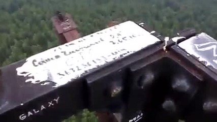 Crazy guy walks on the top of a very high twinkie