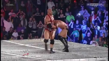 Ryback hits a Shell Shocked on Cm Punk on the Top of the Cell