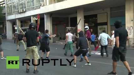 Greece: Riot police clash with far-left protesters in Athens