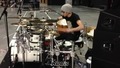Zayn Malik playing the drums