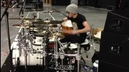 Zayn Malik playing the drums