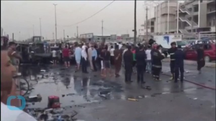 Attacks Around Iraq's Capital Kill 14, Officials Say
