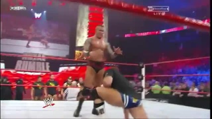 Randy Orton throws Alex Riley on the Nexus