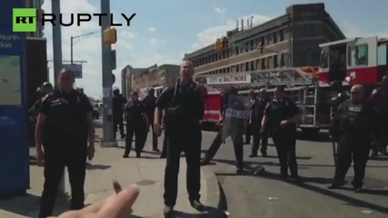 Baltimore Police Pepper Spray Protesters after Alleged Shooting