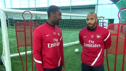Arsenal insider Johan Djourou with Thierry Henry