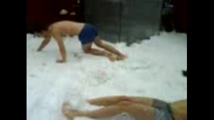 2 silly bros out in the snow in boxers funnu as 