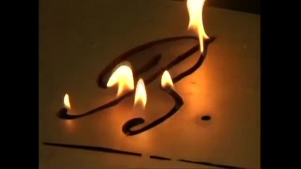 Dancing flames on text engraved on a metal plate - jivkotish