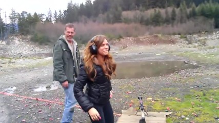 Very Hot Girl shooting .50 Cal rifle