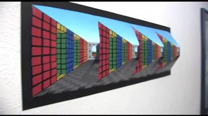 Илюзия с картина на кубче Рубик 
