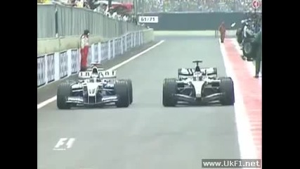 Montoya and Raikonen pit on Interlagos 2004