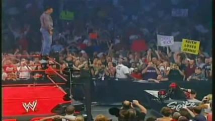 Shane Mcmahon - Diving Elbow Drop trough the annoucer table