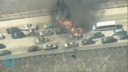 Wildfire Sweeps Across California Freeway, Burns Cars