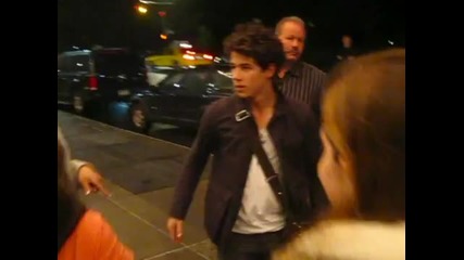 Joe, Nick and Demi pose for pictures with fans - May 18, 2010 