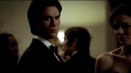Damon watches Elena as she enters the room in her dress