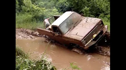 Mud Trucks Huge Chevy 4x4 on Tractor Tires Gets Stuck Deep Twice!!