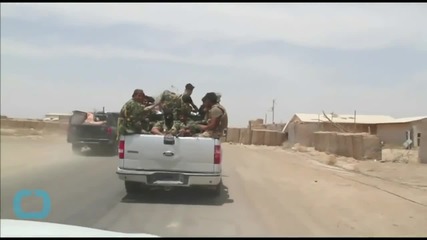 Islamic State Faces Battle in Iraq, Bombs in Syria