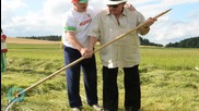 Belarusian President Gives Depardieu a Lesson in Hand-scythe
