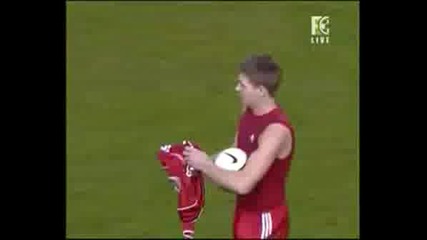 Gerrard Hands Match Ball To Torres