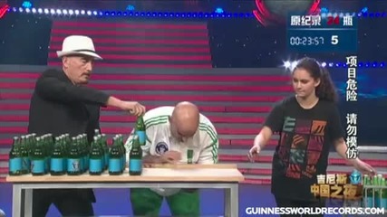 Рекорди Гинес- Bottle Opening With Your Head!