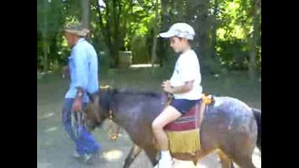Marti - riding - the - horse