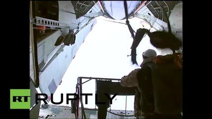 Russia: CSTO troops stage first ever parachute jump onto Arctic ice floes