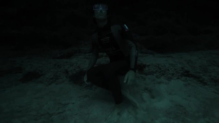 Guillaume Nery base jumping at Dean s Blue Hole filmed on breath hold by Julie Gautier
