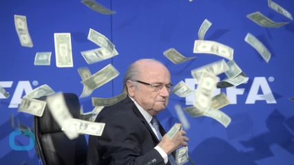 Prankster Showers FIFA President Sepp Blatter With Fake Cash