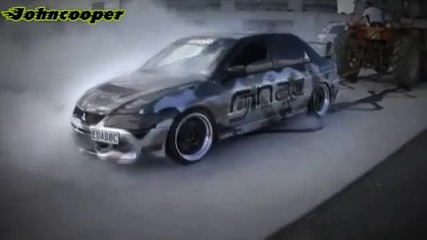 Mitsubishi Evo 4wd Chained to A Tractor Burnout