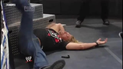 Dolph Ziggler hits a Zig Zag on Edge into the Steel Steps