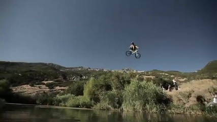 Huge Bike Jump into a Pond 35 feet in the air
