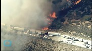 Motorists Flee Freeway Wildfire