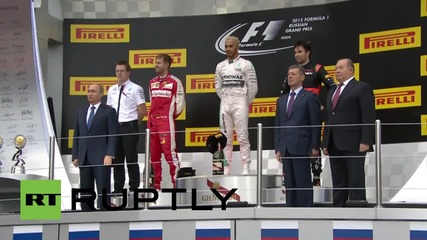 Russia: Putin awards Russian Grand Prix trophy to Lewis Hamilton