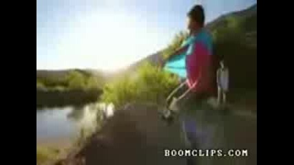 bike jumps in a lake