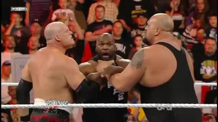 Kane & Big Show hits a Double Chokeslam on Ezekiel Jackson