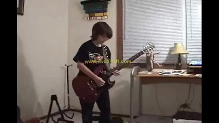 12 year old kid plays Free Bird on guitar 