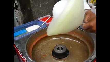 Правене на захарен памук в Китай