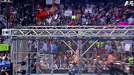 Rey Mysterio soars from the top of the steel cage: Rey Mysterio A&E Biography: Legends sneak peek