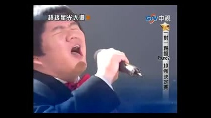 Китайче пее точно като Уитни Хюстън ! 
