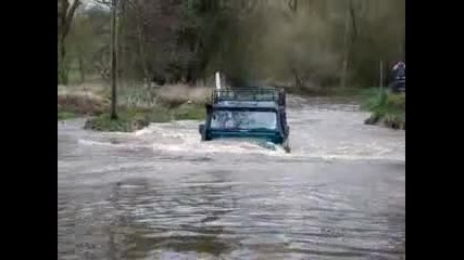 land rover defender 90 nearly swept away in ford 