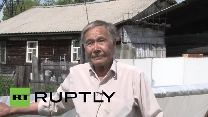 Russia: CUTE seal pup charms Baikal before heading back to the wild