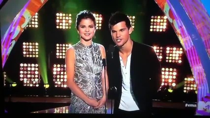 Selena Gomez and Taylar Lautner present
