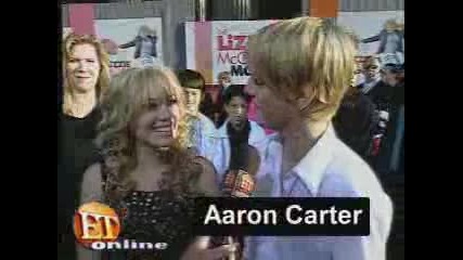 Hilary Duff And Aaron Carter On A Red Carp