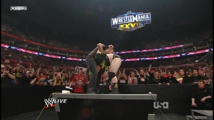 Triple H's Pedigree on King Sheamus into the Announcer Table