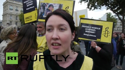 France: Pro-refugee protesters in Paris rally in solidarity